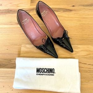 Shiny black leather stiletto pumps